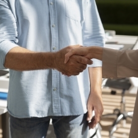 two people shaking hands